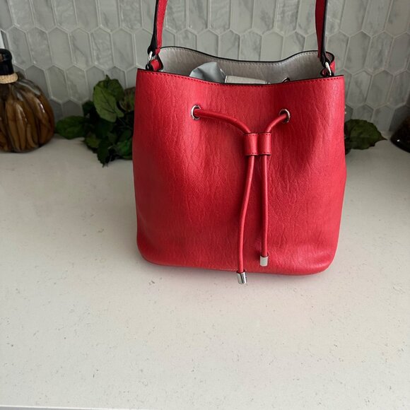 Calvin Klein Handbags - Calvin Klein Red Faux Leather Small Bucket Bag